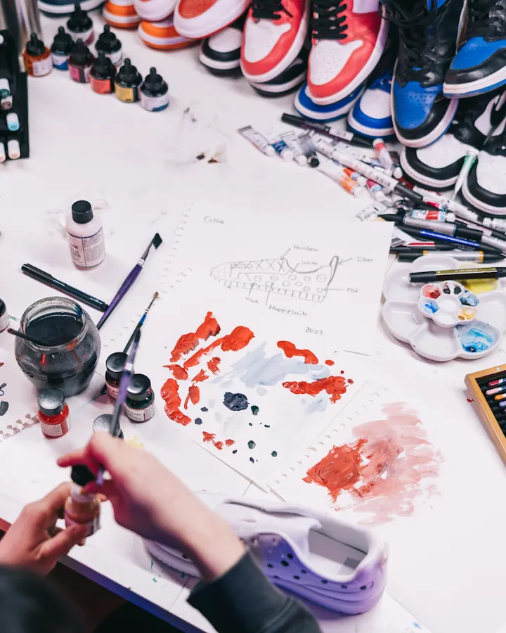 Regulars mid-project at the paint table